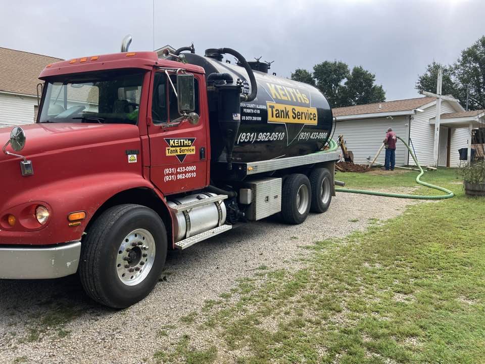 keith's tank service pumping a septic tank
